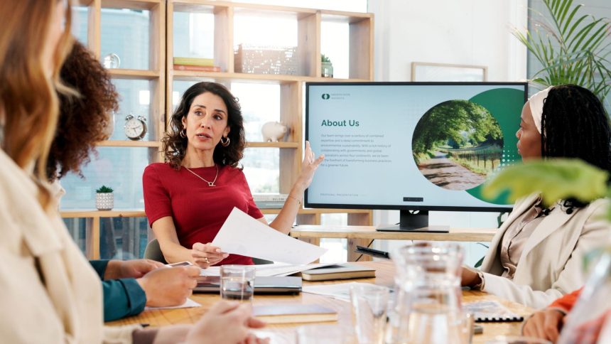 Woman talking and meeting for climate change in office about us and ideas of environment solution People explaining and brainstorming with proposal documents eco friendly information and screen