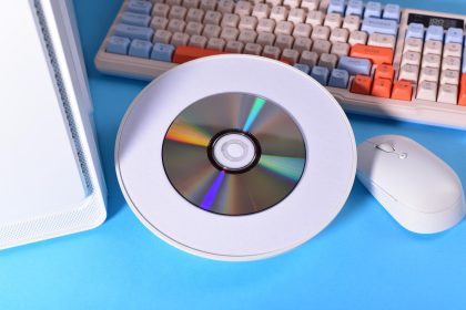 Spinning Retro CD on Blue Tech Surface