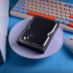 Minimalist tech setup with old hard disk