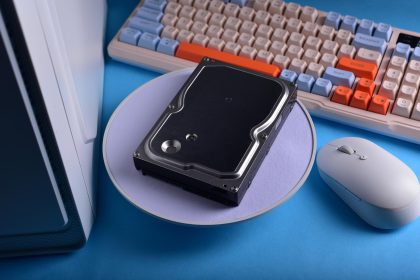 Minimalist tech setup with old hard disk